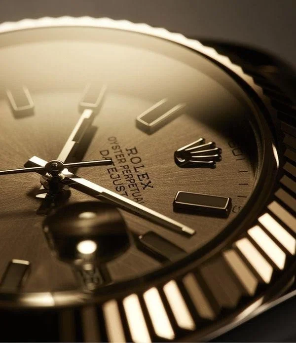 Close-up of a gold Rolex Datejust dial